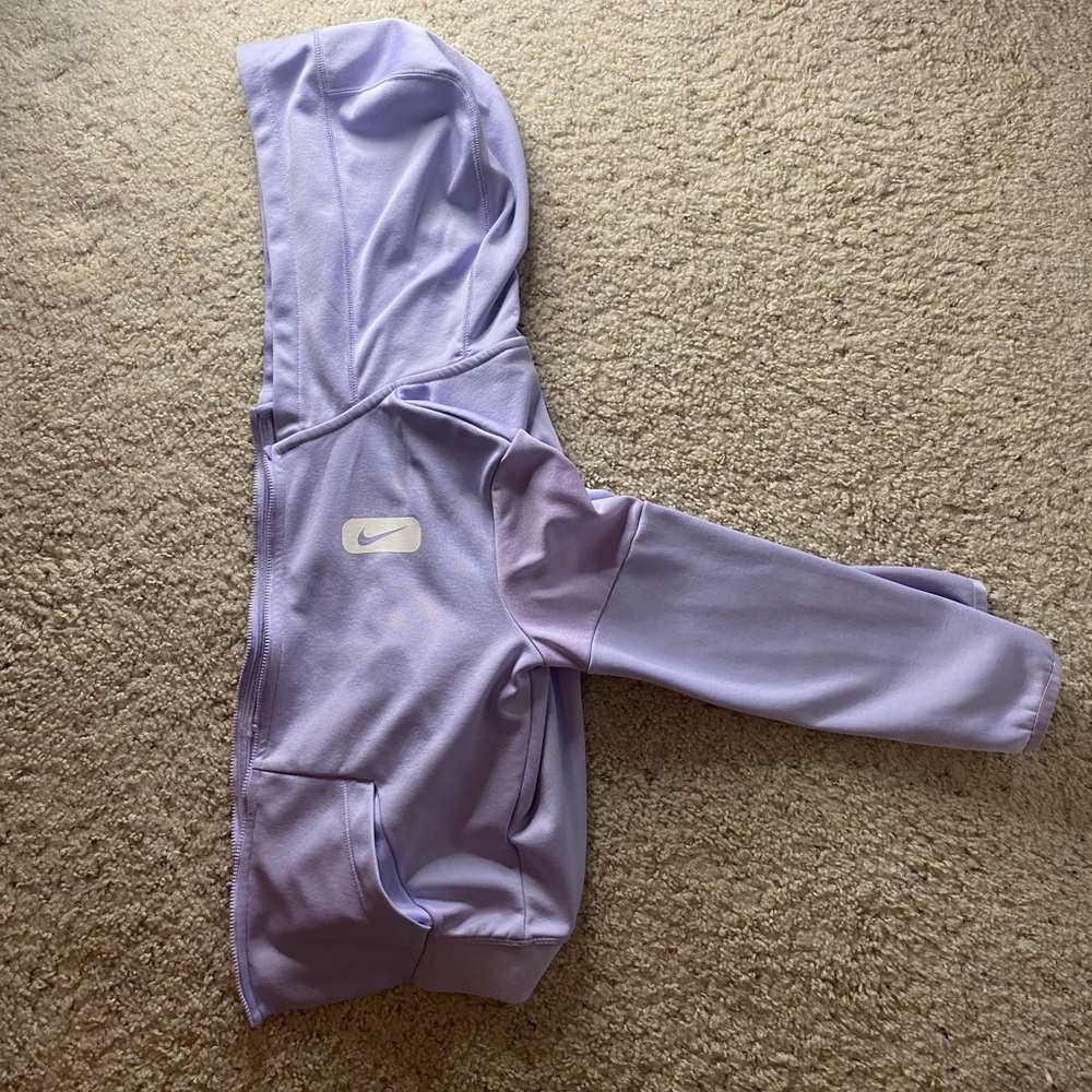 I am selling a used girls Nike jacket. Very good condition. Used for athletics.